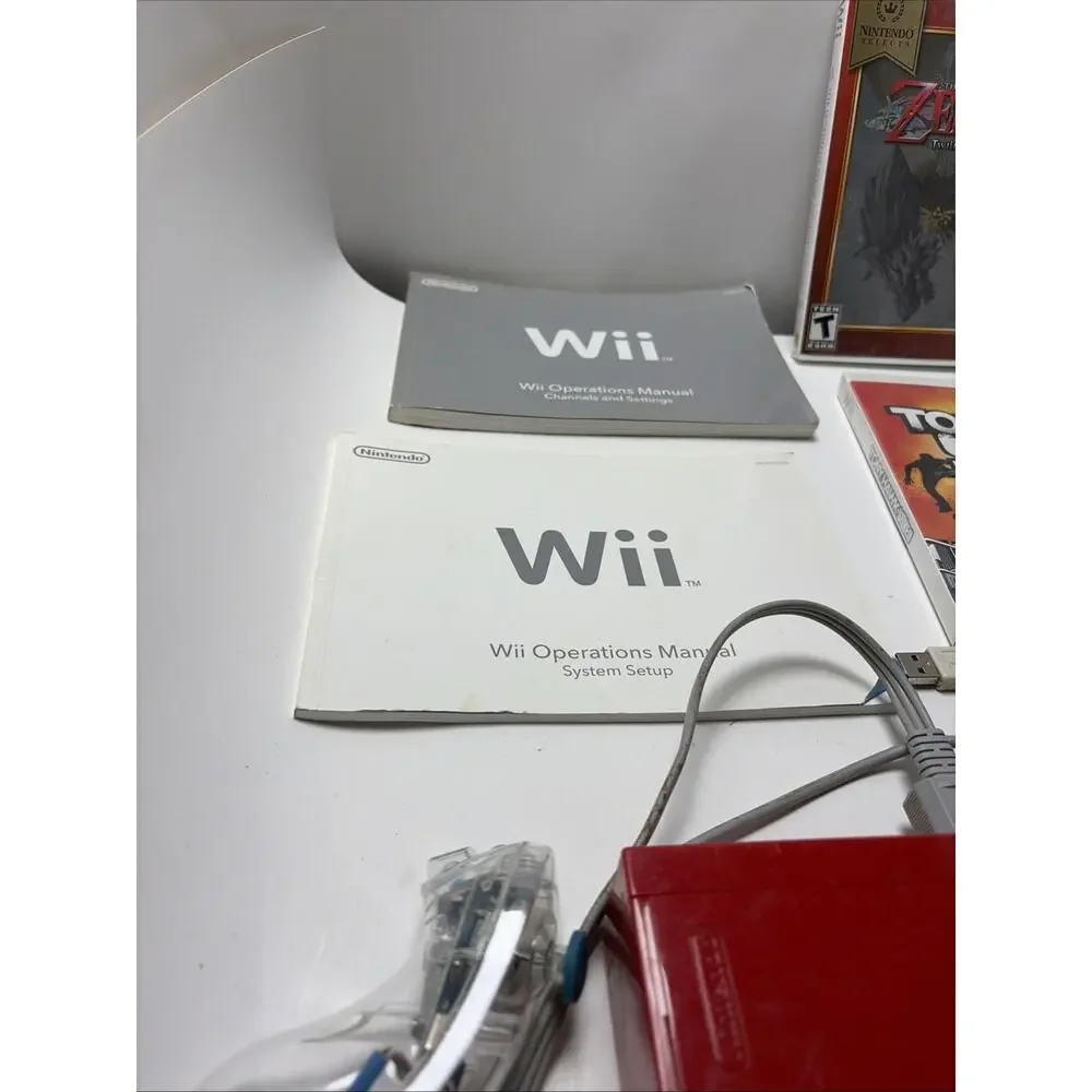 Nintendo Wii 25th Anniversary Red Console Bundle, 3 Remotes, 4 Games ,2 Nunchuk